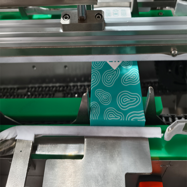 Fully Automatic Ear Spoon Weighing & Cartoning Line